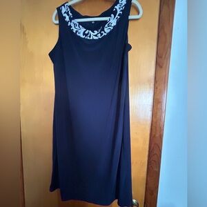 Navy blue tank top with Paisley design around the neck